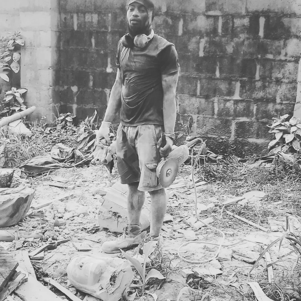 During the installation process, I chopped the Redeemer's statues first, transferred the pieces, before coupling back on the base where they stand today by Henry Aziengbe.